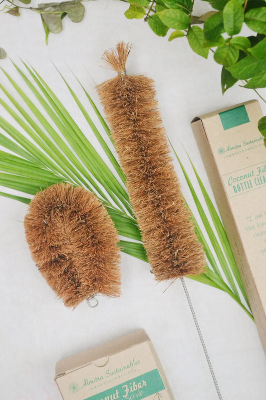 Eco-friendly cleaning brush set with coconut fiber bottle cleaner and vegetable scrubber from Almitra Sustainables.