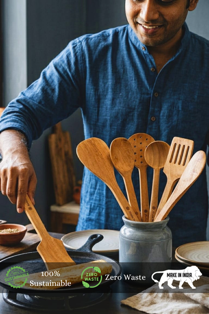 A man is coking dosa ushing almitra sustainables 7-Piece Neem Wood Ladle Set – Sustainable & Handcrafted Utensils