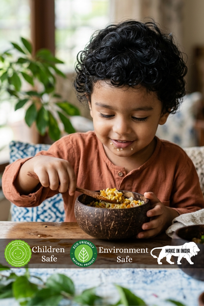 Child is eating using Almitra Sustainables Coconut Bowl