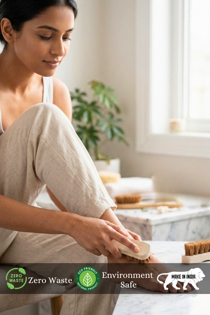 Woman sitting on a chair with Coconut Coir Pedicure Brush – Natural Foot Scrubber for Sustainable Self-Care a zero waste product in a bright room.